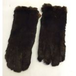 A pair of vintage ladies fur gloves, size 8 by Dents of Worcester.