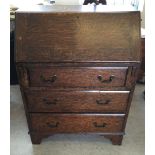 A vintage oak 3 drawer bureau approx 74x99cm