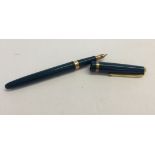 A Conway 103 fountain pen in teal with a 14ct gold nib.