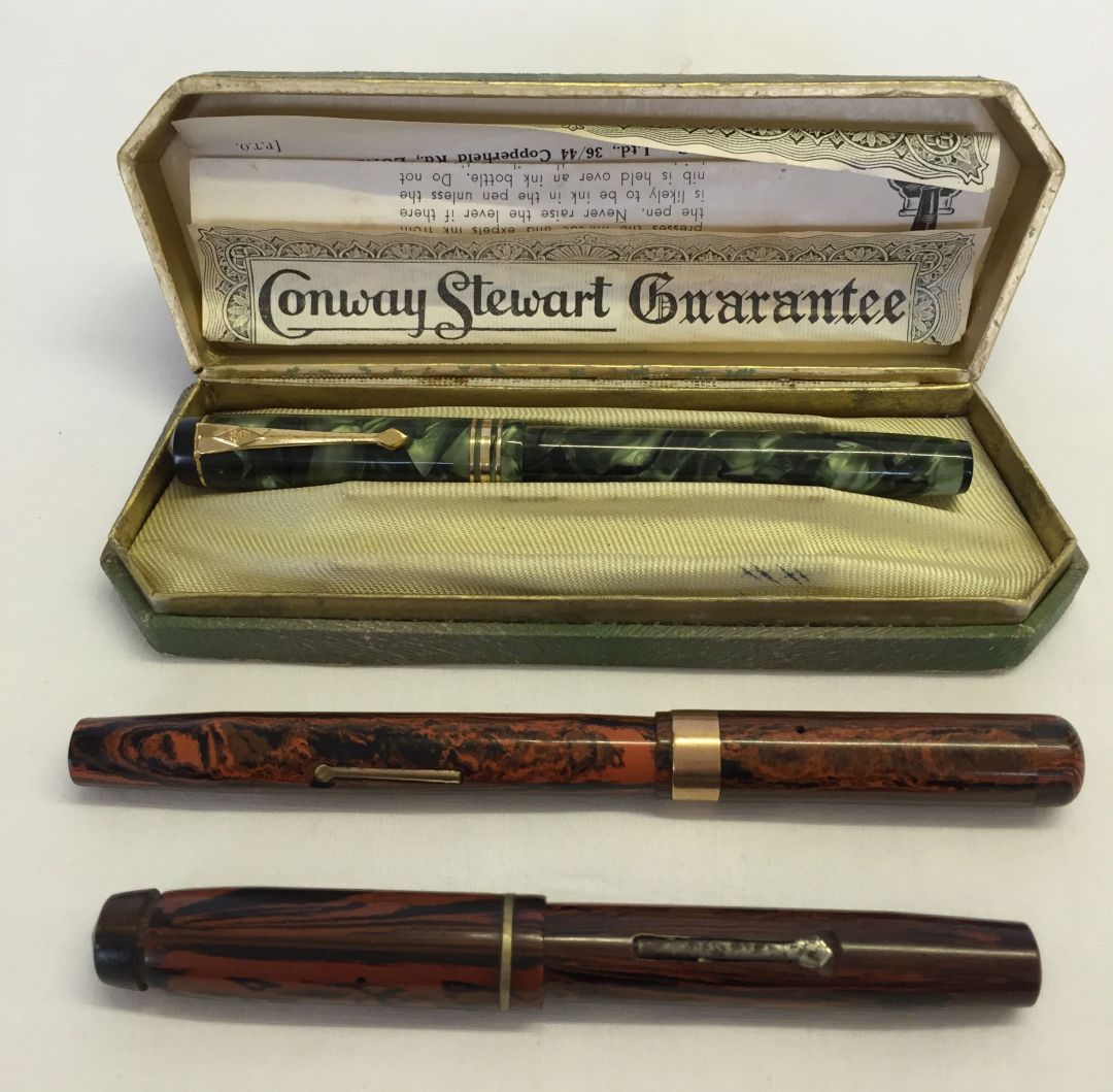 A green Conway Stewart 388 fountain pen with 14ct gold nib in original box together with a Mabie