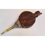 A pair of vintage wooden and brass bellows with carved head decoration.