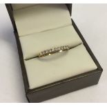 A 9ct yellow gold diamond set eternity ring size P.