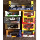 A collection of 9 boxed diecast cars to include Bburago, Brumm, Onyx & Jada Big Time Muscle.