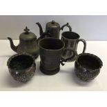 A box of Pewter items to include tankards & coffee pots.