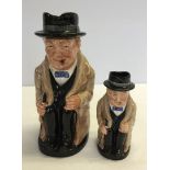 2 Royal Doulton 'Winston Churchill' character jugs. Large approx 23cm high, small a/f.