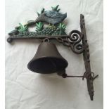 A cast iron reproduction wall hanging bell with Mallard duck decoration.