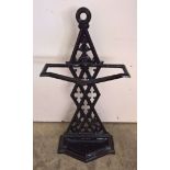 A vintage black painted metal stick stand approx 69cm high.