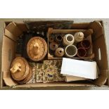 A misc box of items to include a selection of wall tiles, trinket boxes with wooden carved frogs and