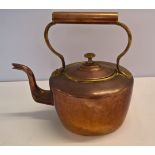 A large copper kettle approx 30 x 32cm including handle & one with a wooden handle.