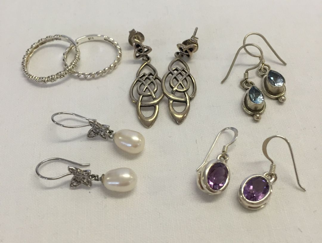 4 pairs of 925 silver earrings, - amethyst oval drops, blue topaz teardrops, dangly celtic design