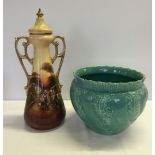 2 large ceramic items: a large urn shaped vase (restoration to lid) and a blue/green coloured