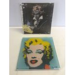 2 boxed Rosenthal square shaped glass platters from the Andy Warhol celebrities range -