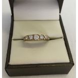 9ct gold ladies dress ring with a Victorian style setting set with 5 Cubic Zirconia. Weight approx