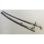 A Mameluke sword with curved 27 blade and ivory handle (repaired), unmarked, in steel scabbard.