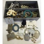 A box containing a large quantity of quality costume jewellery. Some still on cards.