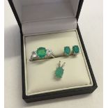 A 925 silver and Ethiopian blue opal jewellery set comprising a pair of stud earrings, oval