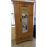 Vintage pine wardrobe with drawer to base. Mirror to door front. Arts & Crafts detail. 74" tall x