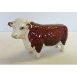 A Beswick Hereford Bull marked Champion of Champions model #1363.