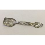 Danish petit fours serving spoon by Borge Alexis Godtbergsen. Art Nouveau design handle. Marked 830S