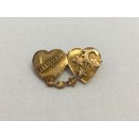 MIZPAH sweetheart brooch. Heart frame and decoration tests as 9ct. Ivy leaf decoration is in rose