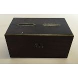 A small wooden and brass 2 slot money box.