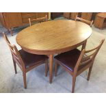 A Schreiber extending table & 4 chairs c1970s.