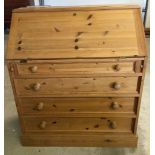 A modern solid pine bureau. Approx 88 x 103cm.