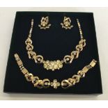 A vintage suite of Sarah Coventry costume jewellery comprising of necklace, bracelet and earrings