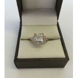 Hallmarked 9ct gold dress ring with large square cut champagne quartz with 2 small diamonds down