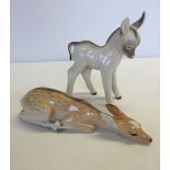 2 Lomonosov animal figurines. A fawn laying down with red USSR backstamp and a donkey with a red '