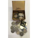 A box of commemorative coins to include Churchill, Charles & Diana and the Queen Mother.