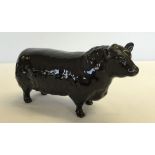 A Beswick black Aberdeen Angus Bull figurine with Gold backstamp marked "Approved by the Aberdeen