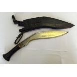 Large vintage Kukri knife in a leather sheath with belt straps. Handle engraved D R Hull. Sheath