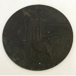 A WW1 bronze death plaque awarded to Cecil Claude Frederick Staden.