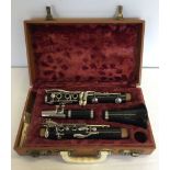 A vintage cased Besson Embassy clarinet.