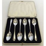 A set of 6 HM silver teaspoons in velvet lined box. HM Sheffield 1931. Decoration to handles.