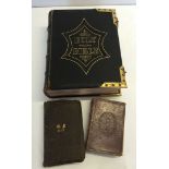 A large family Bible with commentaries from Scott and Henry together with 2 smaller bibles.