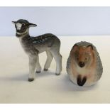 2 Lomonosov animal figurines. A lamb with red USSR backstamp approx 11cm high and a hedgehog with