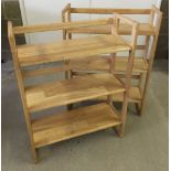 2 pine folder away shelf units from John Lewis. When open 37" tall x 28" wide x 11.5" deep approx.