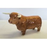 A Beswick ceramic Highland Bull figurine in tan brown gloss finish model #2008.