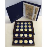 A set of 36 silver medals 'The Beauty of Britains Churches' Limited Edition. With folder of