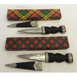 2 Scottish 'Skean-Shu' dirk knives with decorative handles and sheaths. One by J.Nowill & Sons