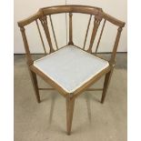 A light wood corner chair, split to back needs attention.
