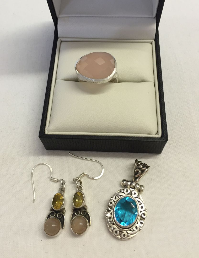 3 items of 925 silver jewellery comprising a pendant with a blue coloured stone, a pair of citrine