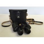 A pair of vintage Russian Prism Binoculars with central focusing.