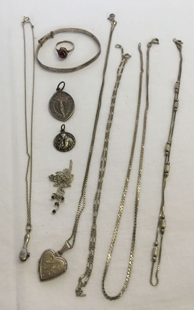 Quantity of silver jewellery comprising 6 necklaces, 2 pendants, a childs christening bangle and a