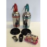 2 vintage chrome soda syphons one red and one in rarer green colourway. With drip trays, keys, and