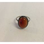 A vintage 925 silver ring set with a large oval carnelian. Size U1/2.