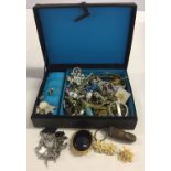 An oriental style box containing costume jewellery to include vintage pieces.