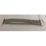 A hallmarked silver heavy 3 chain bracelet with T bar fastening, total weight approx 77g.